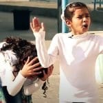Two Palestinian children performing a play