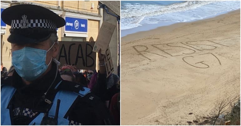 A police liaison officer and resist G7 written on the sand