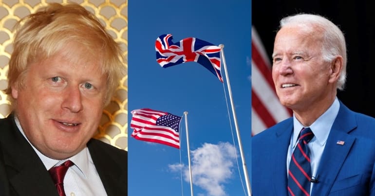 UK prime minister Boris Johnson, a US flag and a UK flag, and US President Joe Biden