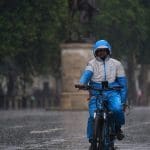 A cyclist on a rainy street in London