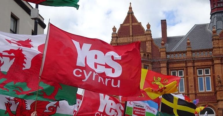 Welsh flags at a Welsh independence march