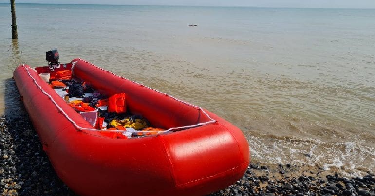 A boat which carried several families with children across the Channel