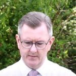 Jeffrey Donaldson and the DUP logo