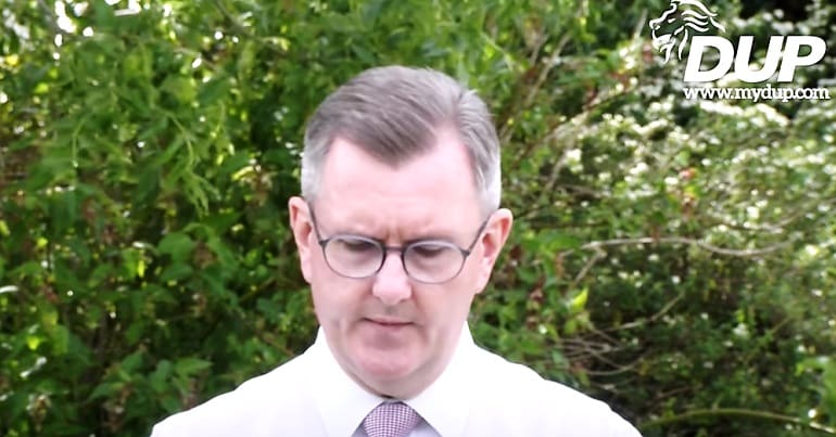 Jeffrey Donaldson and the DUP logo