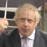 Boris Johnson with an umbrella