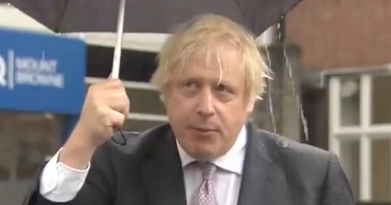 Boris Johnson with an umbrella
