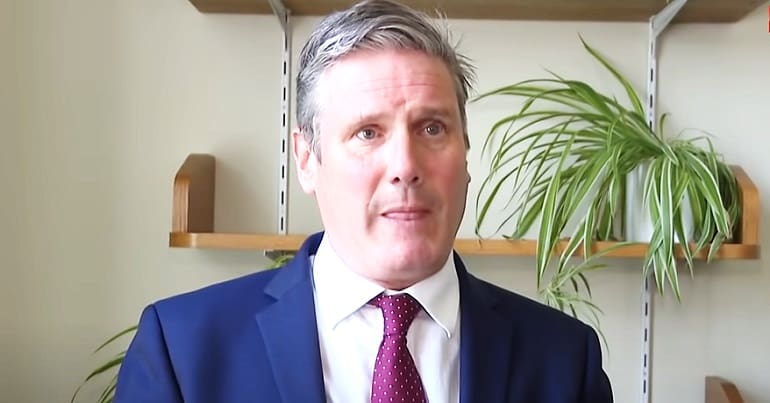 Labour leader Keir Starmer biting his lip workers