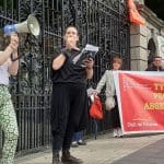 Anti mining protesters addressing protesters at the gates of the Irish parliament