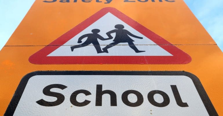 A school crossing sign