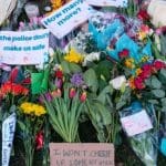 Flowers and notes at demonstration following the murder of Sarah Everard