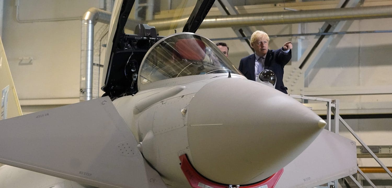 23/07/2020. Scotland, United Kingdom. Boris Johnson visits Scotland. Prime Minister Boris Johnson looks at a Typhoon fighter jet at RAF Lossiemouth, Moray, as part of his tour of Orkney and the Highlands. Picture by Andrew Parsons / No 10 Downing Street
