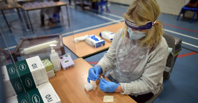 Medical staff testing samples