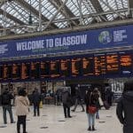 A COP26 'Welcome to Glasgow' sign at Glasgow Central station