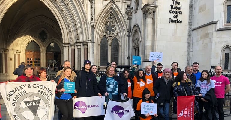 People outside the DWP court case