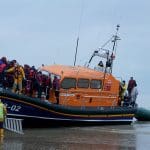 Migrants being rescued by an RNLI lifeboat