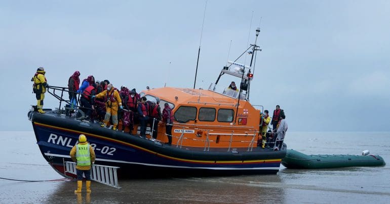 Migrants being rescued by an RNLI lifeboat