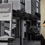 A vote Labour sign and Andrew Brogan holding a notice to quit