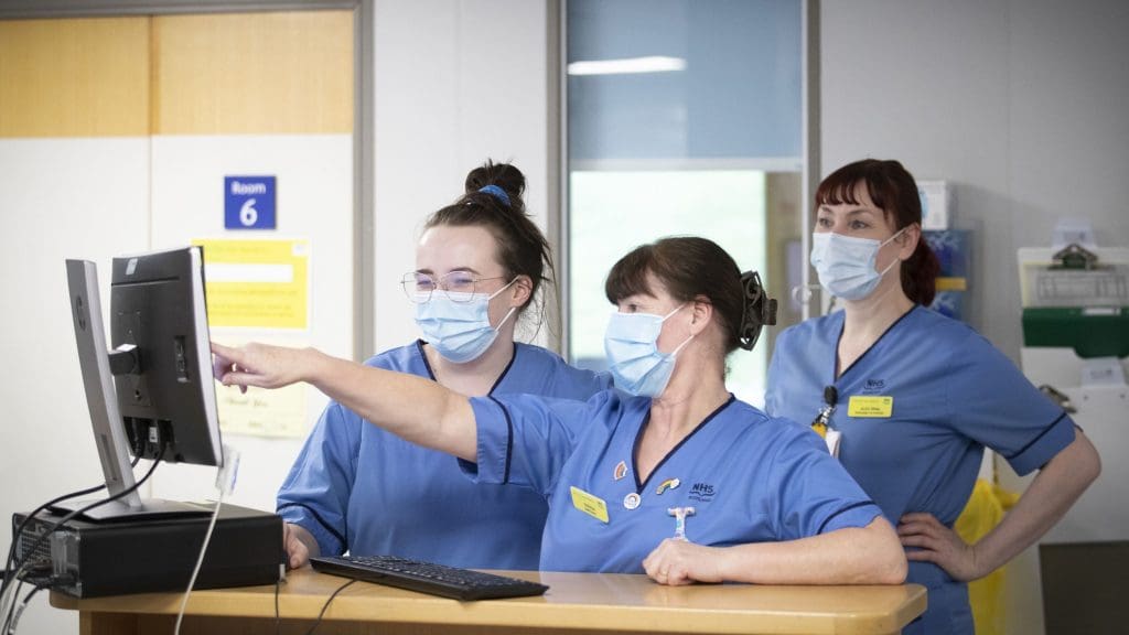 Nurses at work in face masks