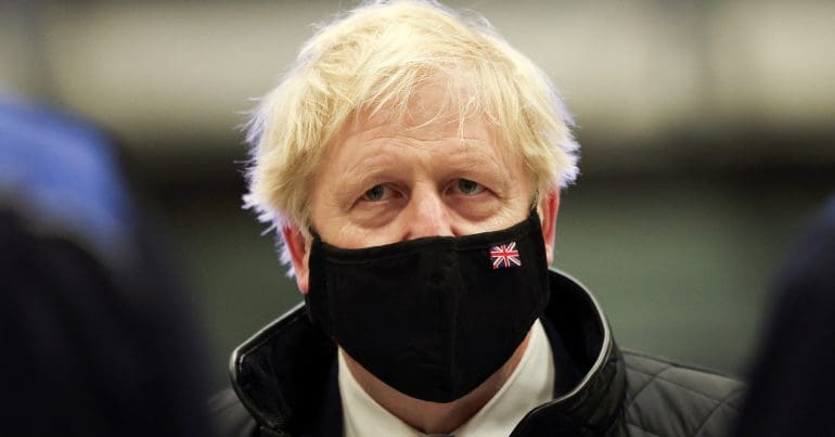 Boris Johnson wearing a mask