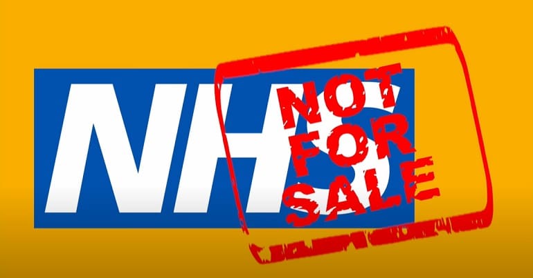 A sign that reads NHS not for sale representing campaign group NHS SOS