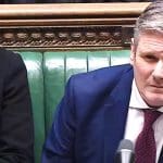 Labour leader Keir Starmer squinting in parliament