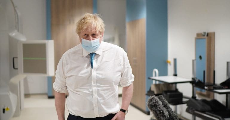 Boris Johnson wearing a mask