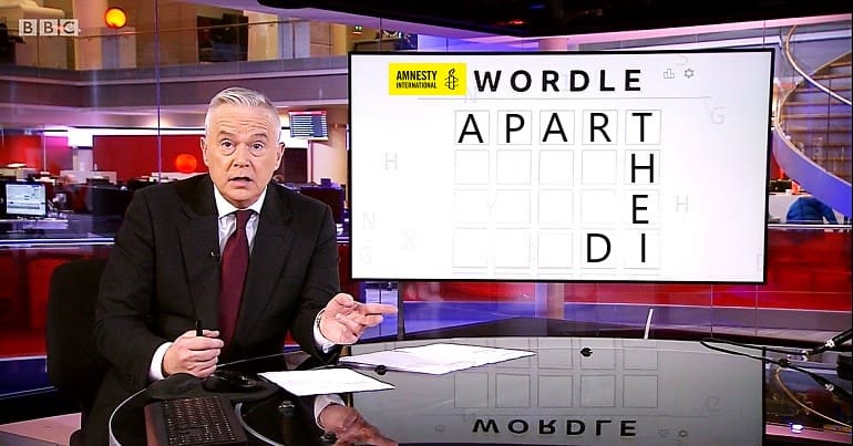 A clip from BBC News at Ten with the word apartheid spelled out and the Amnesty logo