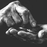 A pair of hands counting money representing broadband price rises
