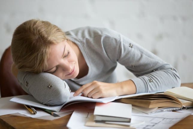 A picture of a woman looking tired