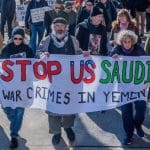 Demonstrators protesting US support for Saudi Arabia