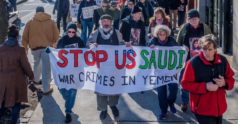 Demonstrators protesting US support for Saudi Arabia