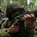 Russian soldier takes aims