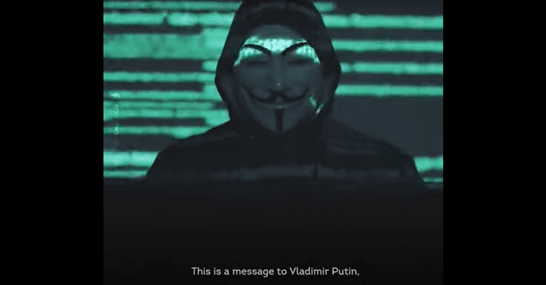 Masked individual from the hacker collective Anonymous
