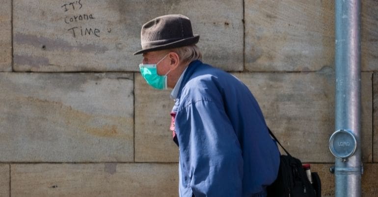 Old man in mask