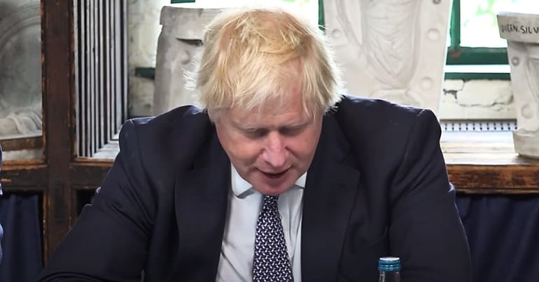Boris Johnson looking down