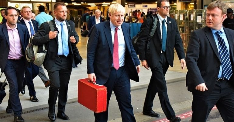 Boris Johnson with his entourage
