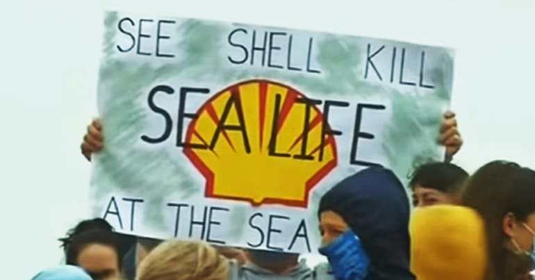 A placard at a protest against Shell's seismic testing along the Wild Coast that read " See Shell Kill Sea Life At The Sea Shore"