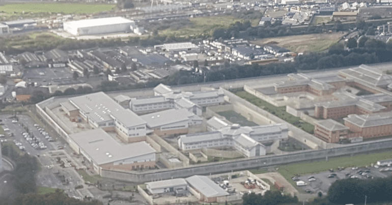 Aerial view of HM Prison Isis and a section of HM Prison Belmarsh (on the right) in Thamesmead West, south-east London, shortly before landing at London City Airport