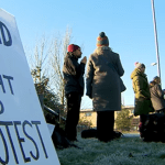 Placard reading 'Defend the right to protest'