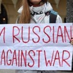Woman holds an antiwar sign in Russia