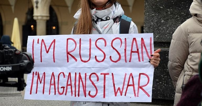 Woman holds an antiwar sign in Russia