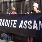 A don't extradite Assange banner from the human chain