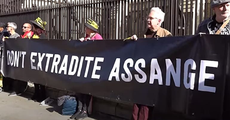 A don't extradite Assange banner from the human chain