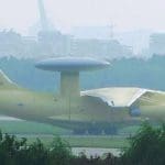 Chinese surveillance plane sits on a smoggy runway.