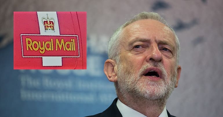 Jeremy Corbyn looking at the Royal Mail logo