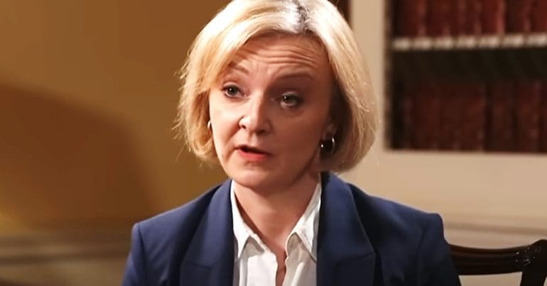 Liz Truss looking to the right