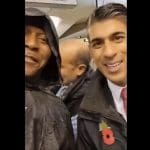 Rishi Sunak wearing a red poppy