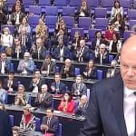 The German parliament with pictures of both the UK and German finance ministers