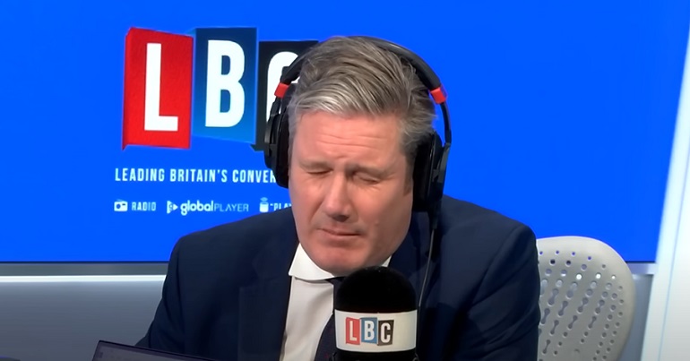 Keir Starmer with his eyes shut
