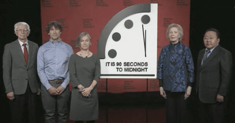 Bulletin of Atomic Scientists present the Doomsday Clock's present position of 90 seconds to midnight